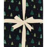 Product photo of the Kyte Bamboo Quilt Blanket in Twinkle Tree 2.5 wrapped in an ivory bow