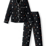 Black Long-Sleeved Women's Pajama Set in Halloween Friends print on a white background