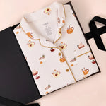 Long-Sleeved Women's Pajama Set in Pumpkin Spice Latte print on a white background
