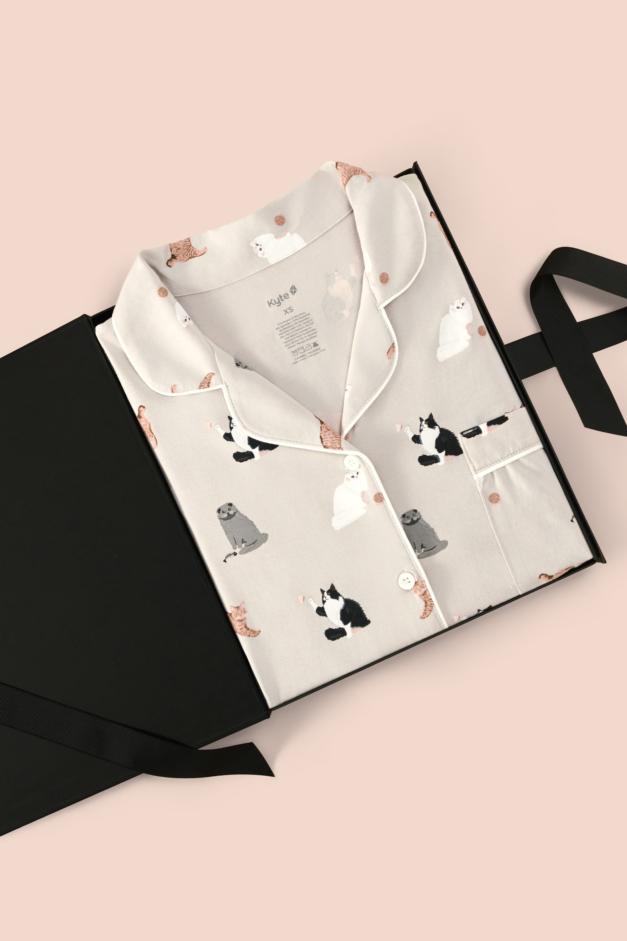 Women's Short Sleeve Pajama Set in Fluffy Cat packed in a box on a beige background