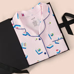 Women's Short Sleeve Pajama Set in Sakura Mahjong packed in a box on a beige background