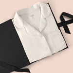 Women’s Short Sleeve Pajama Set in Oat packed in a box on a beige background