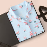Women's Short Sleeve Pajama Set in Breeze Peony packed in a box on a beige background