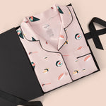 Women's Short Sleeve Pajama Set in Blush Sushi packed in a box on a beige background