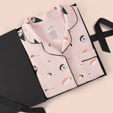 Women's Short Sleeve Pajama Set in Blush Sushi packed in a box on a beige background