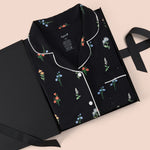 Women's Short Sleeve Cropped Pajama Set in Midnight Wildflower print packed in a box on a beige background