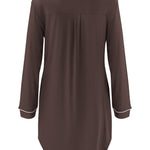 Brown long-sleeve shirt with white trim on a white background