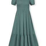 Front side of Women’s Smocked Dress in Pine on a white background