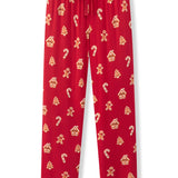 Red holiday-themed lounge pants with an all-over print of gingerbread men, candy canes, and gingerbread houses, featuring an elastic waistband and drawstring.