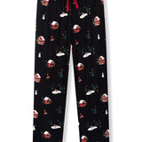 Black holiday-themed lounge pants with a red drawstring and an all-over print of snow-covered cabins, trees, and snowmen, shown flat against a white background.