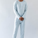 Smiling model wearing the Men's Jogger Set in Fog