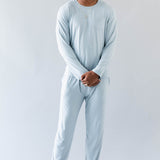 Smiling model wearing the Men's Jogger Set in Fog