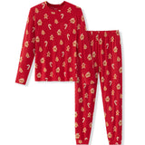A two-piece red pajama set featuring a long-sleeve top and matching pants, both printed with a repeating pattern of small gingerbread cookies and candy canes, shown on a plain white background.