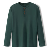 A dark green long-sleeve henley shirt with three brown buttons on the chest, displayed flat against a white background.