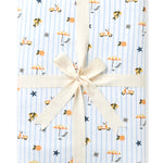 Throw blanket in Amalfi Coast folded and packaged with a cream ribbon 