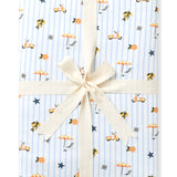 Throw blanket in Amalfi Coast folded and packaged with a cream ribbon 