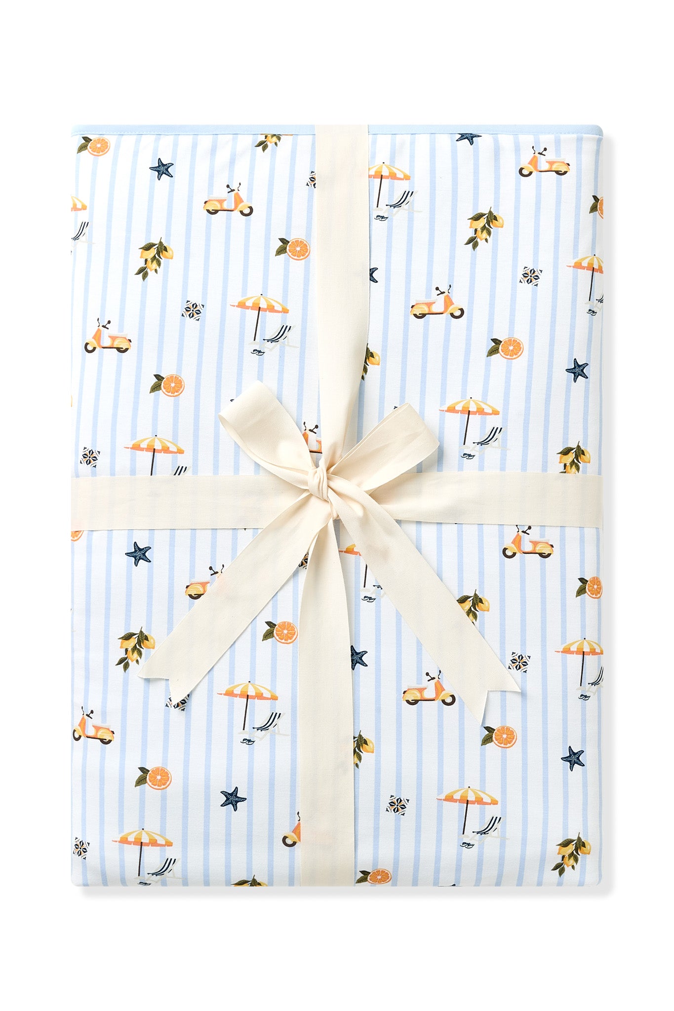 Throw blanket in Amalfi Coast folded and packaged with a cream ribbon 