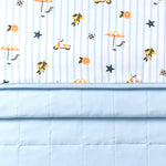 Folded Throw blanket in Amalfi Coast with printed and quilted sides showing 