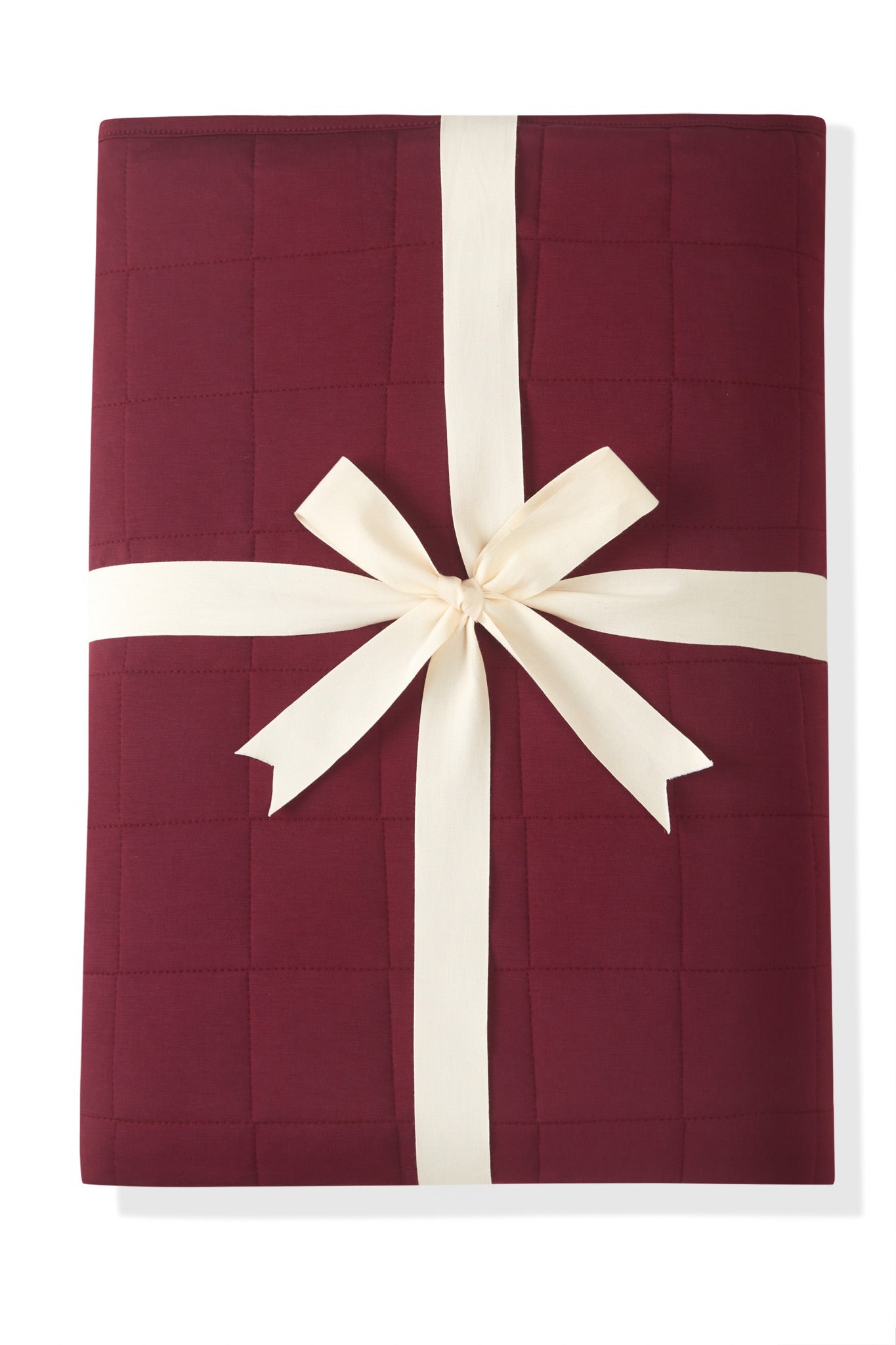 Youth Blanket in Burgundy 2.5 wrapped in a ribbon bow on a white background