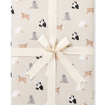 Throw Blanket in Fluffy Cat 1.0 shown in its packaging tied with a linen bow