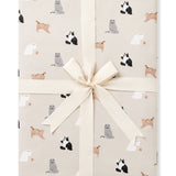 Throw Blanket in Fluffy Cat 1.0 shown in its packaging tied with a linen bow