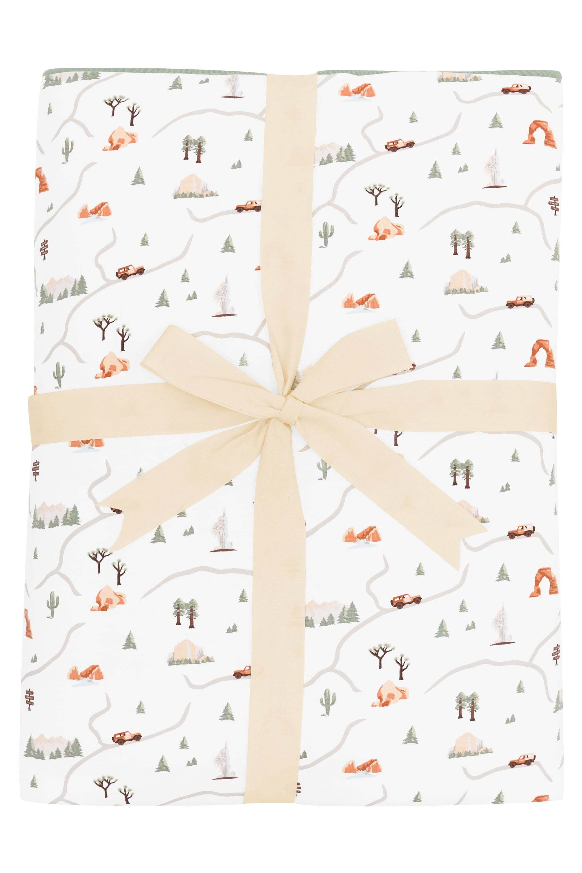 Youth Blanket in Road Trip 2.5 shown wrapped in its bow packaging