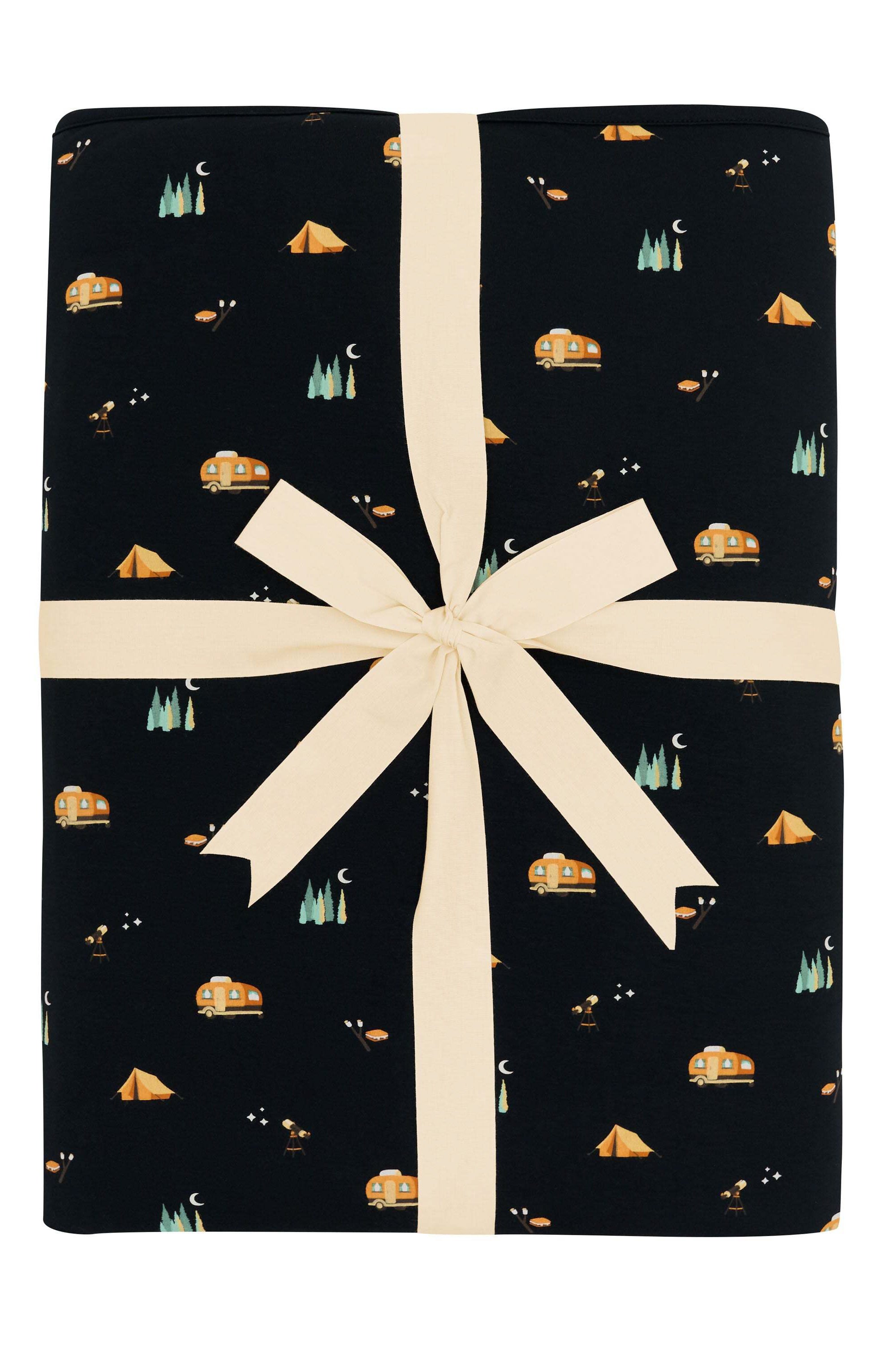 Youth Blanket in Under the Stars 2.5 shown in its bow packaging
