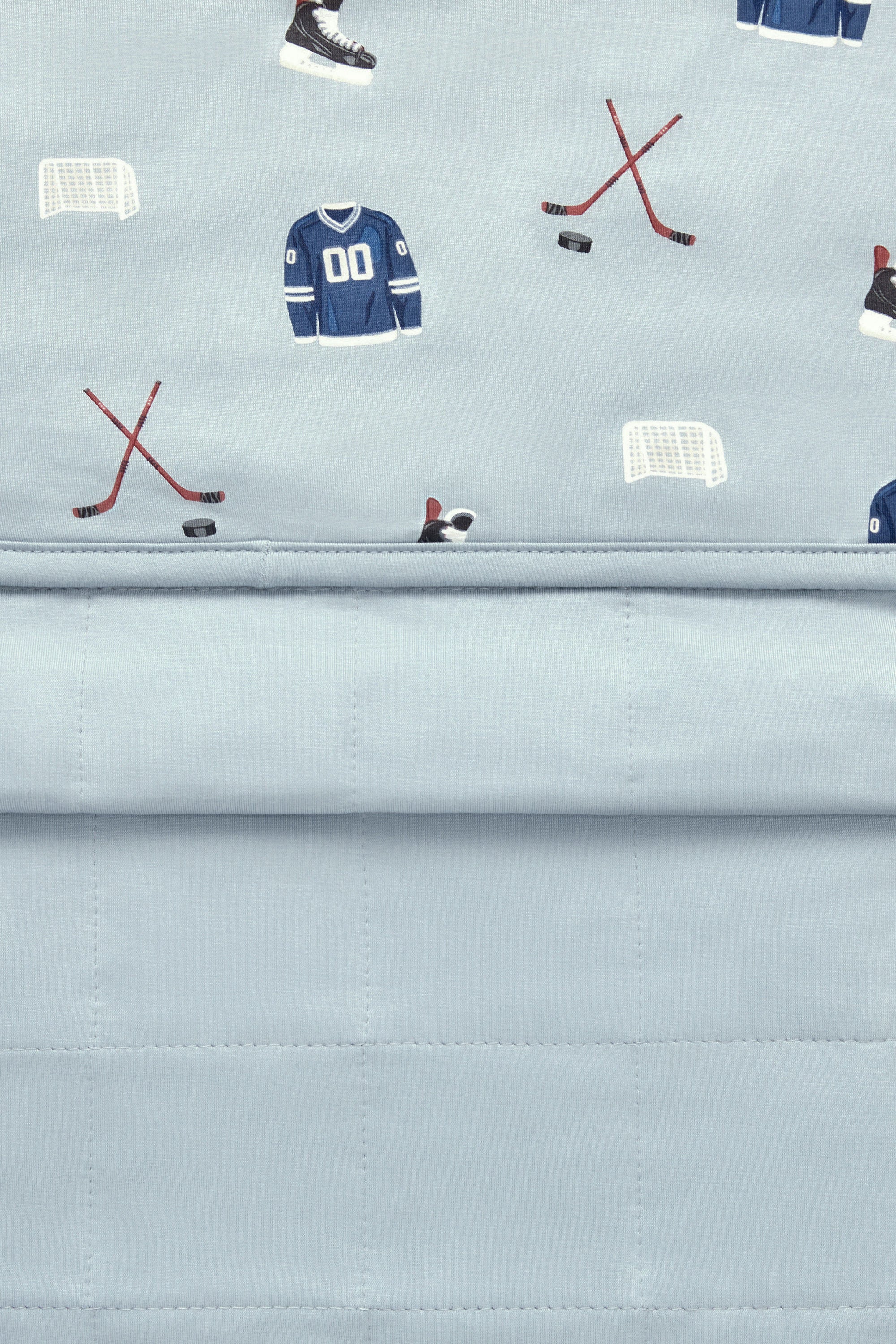 Front and Back of Throw Blanket in Vintage Hockey 2.5 print