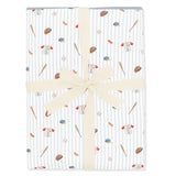 Folded Bamboo Throw Blanket in Home Run 1.0 wrapped in an ivory bow