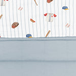 Close up of olded Bamboo Throw Blanket in Home Run 1.0 displaying printed and quilted sides