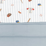 Close up of olded Bamboo Throw Blanket in Home Run 1.0 displaying printed and quilted sides