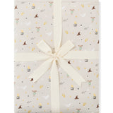 Product photo of a folded Throw Blanket in Starry Icon 1.0 wrapped in an ivory bow 