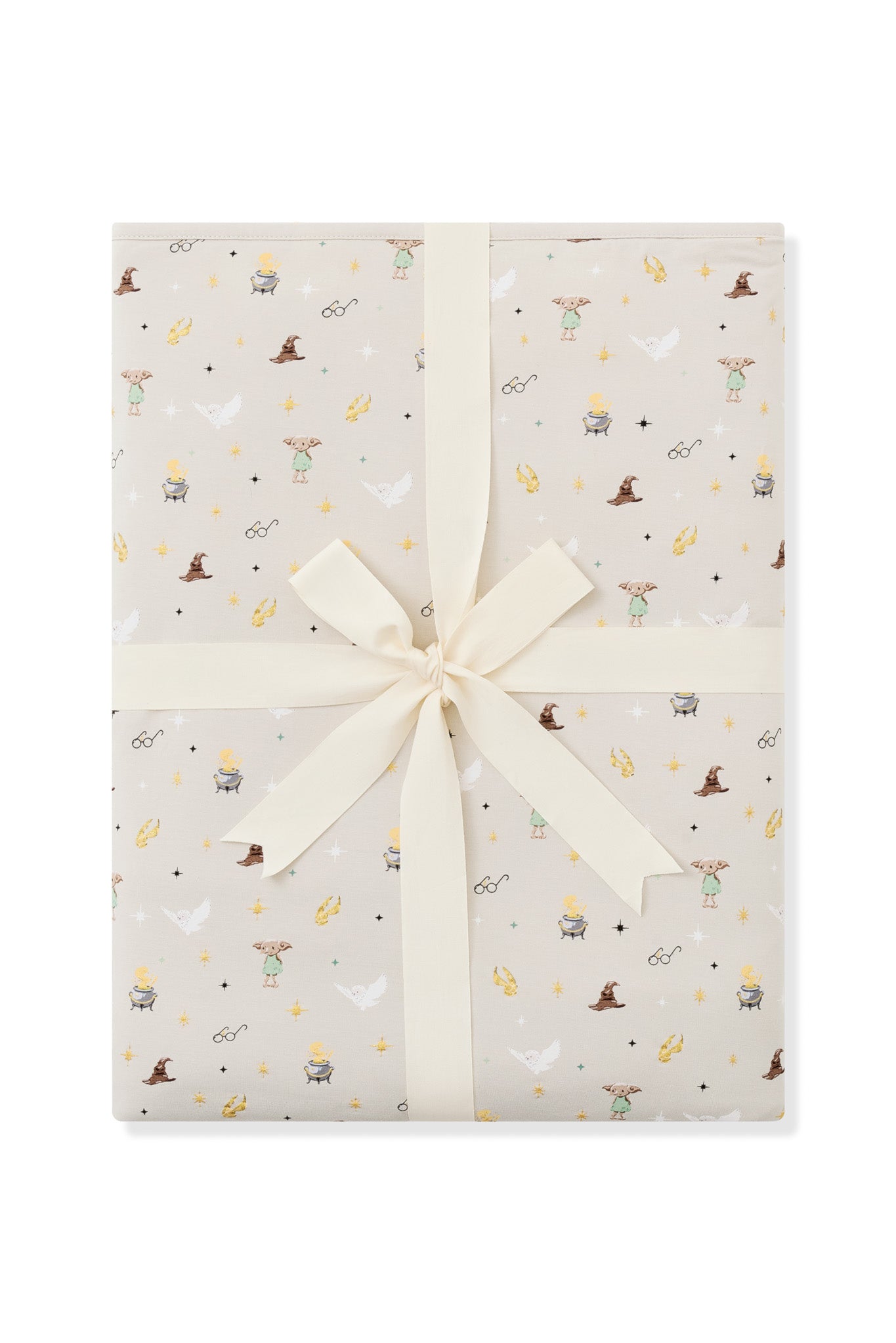 Product photo of a folded Throw Blanket in Starry Icon 1.0 wrapped in an ivory bow 