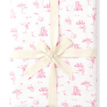 Product photo of a folded Bamboo Throw Blanket in Toile Ballet 1.0 wrapped in an ivory bow