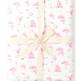 Product photo of a folded Bamboo Throw Blanket in Toile Ballet 1.0 wrapped in an ivory bow