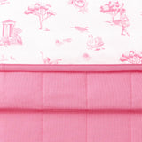 Close up of the Bamboo Throw Blanket in Toile Ballet 1.0 showcasing the printed and quilted sides
