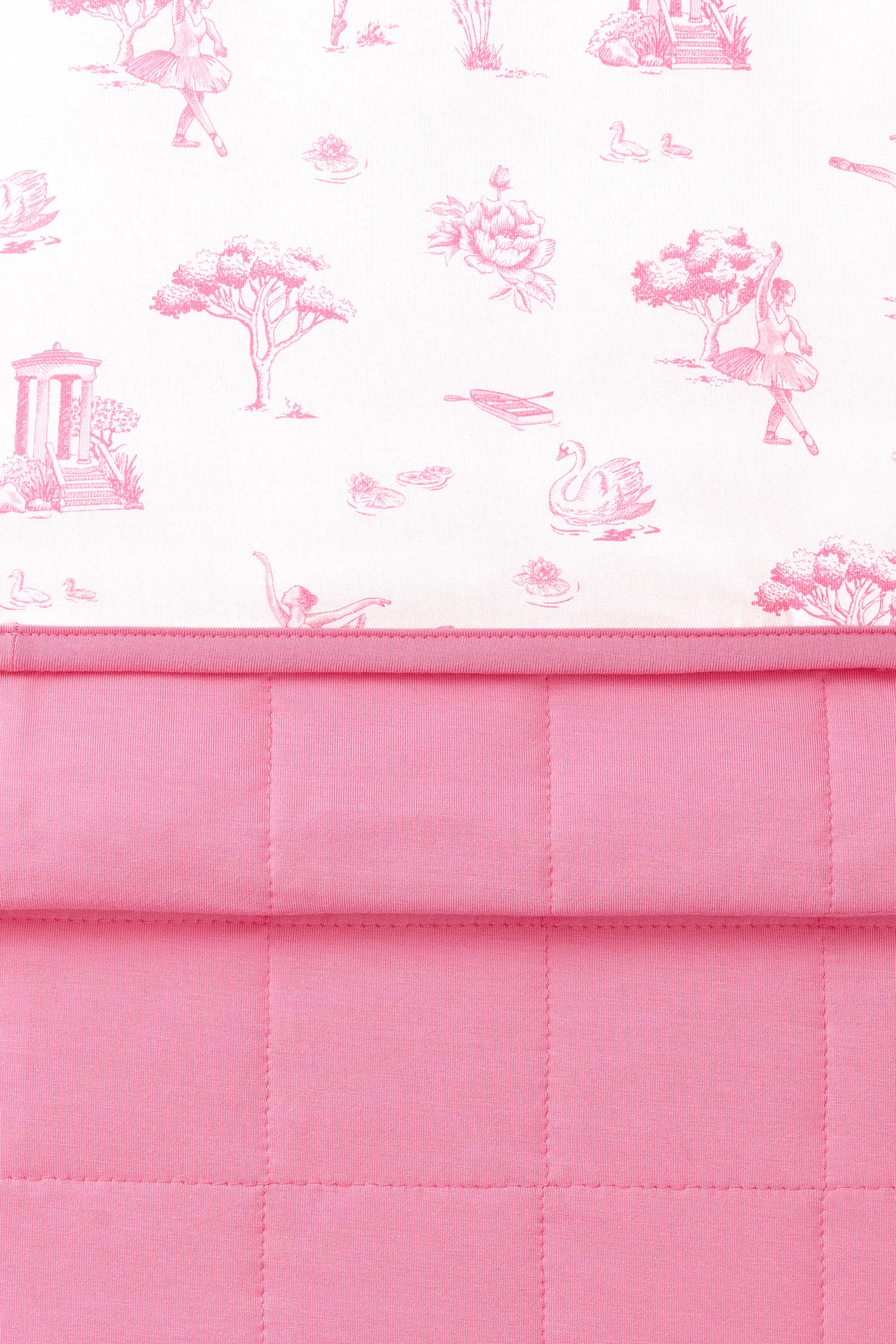 Close up of the Bamboo Throw Blanket in Toile Ballet 1.0 showcasing the printed and quilted sides