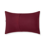 Back side of Standard Pillowcase in Burgundy on a white background