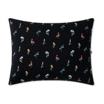 Standard Pillowcase in Midnight Wildflower on a pillow on a white background 