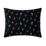 Standard Pillowcase in Midnight Wildflower on a pillow on a white background 