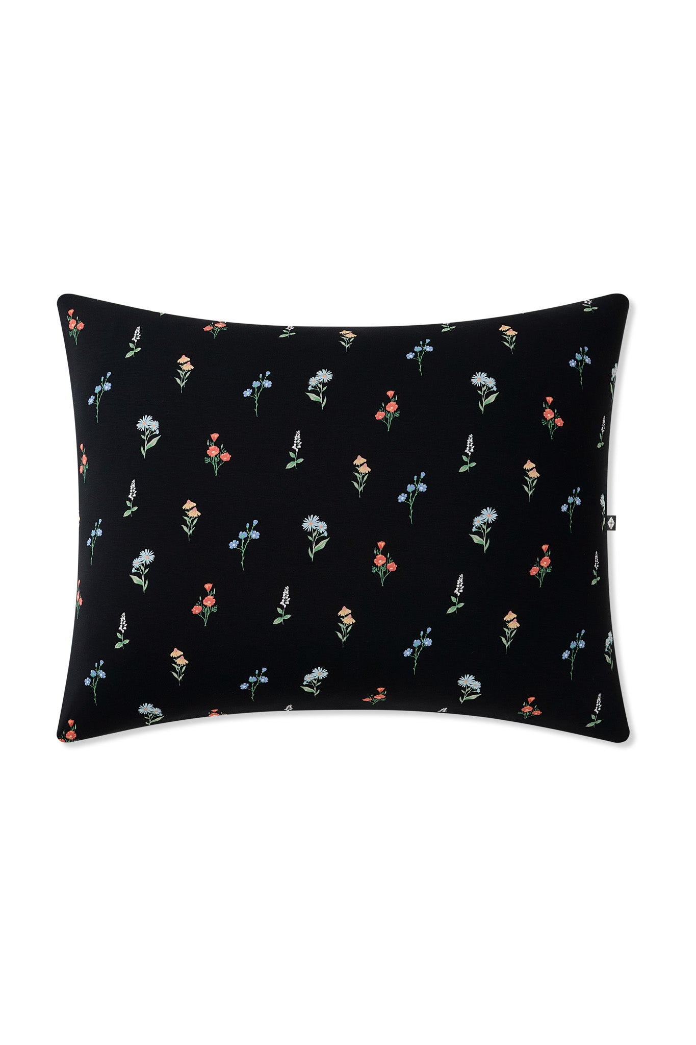 Standard Pillowcase in Midnight Wildflower on a pillow on a white background 
