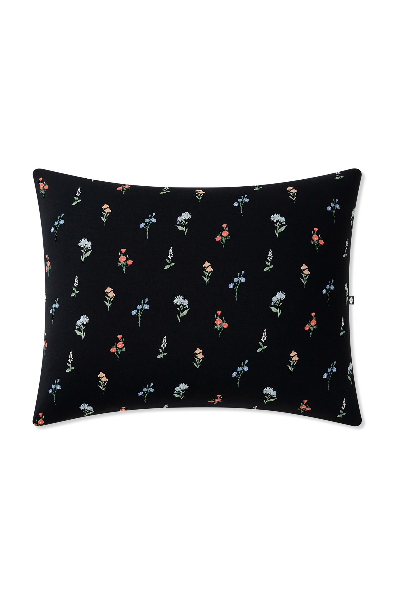 Standard Pillowcase in Midnight Wildflower on a pillow on a white background 