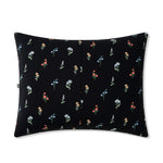 Backside of the Standard Pillowcase in Midnight Wildflower on a pillow on a white background 