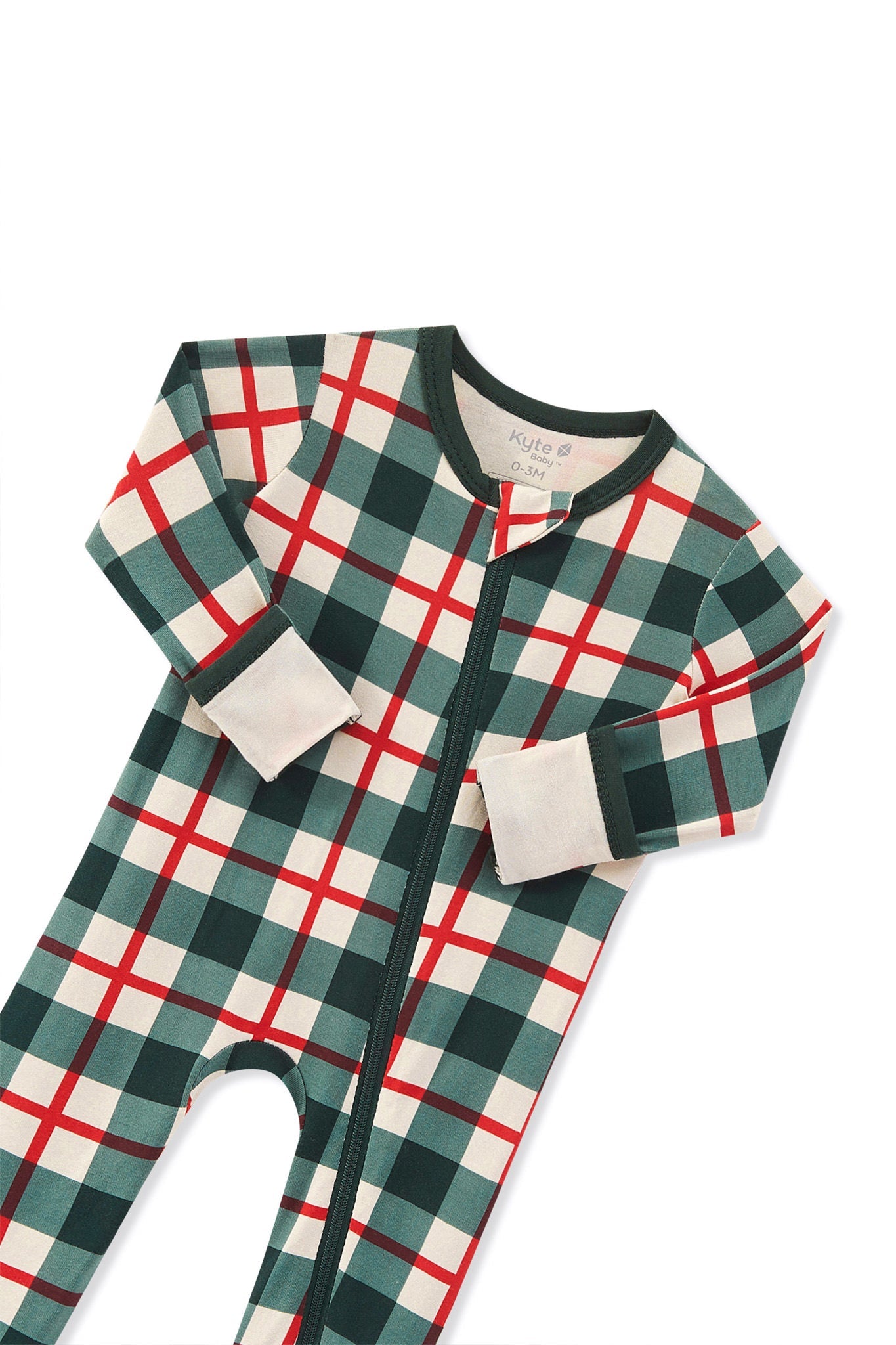 A zippered romper with a green, red, and white plaid pattern, featuring a front zipper and ribbed cuffs shown on a white background