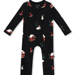 A zippered romper in black, featuring a festive winter print of red cabins, snowmen, and Christmas trees with zipper displayed flat against a white background.