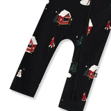 Bottom part of Black zippered romper with a festive Christmas winter wonderland print featuring snow-covered cabins, snowmen, and trees, shown on a white background.