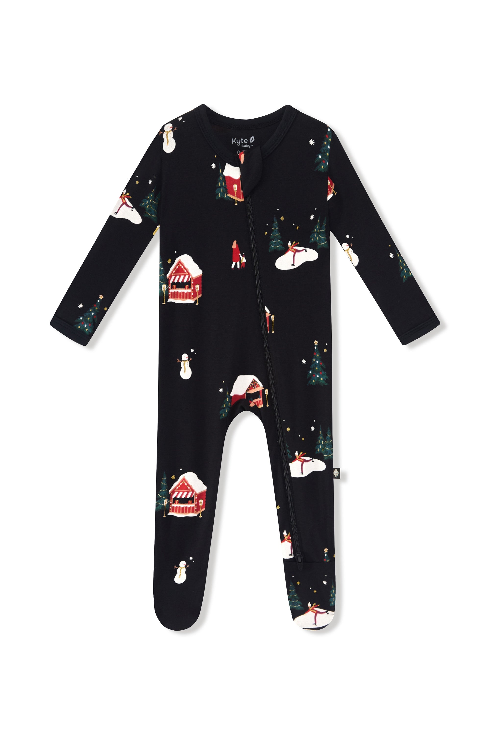 A black zippered footie with a winter wonderland print of snowmen, snow-covered houses, and Christmas trees, shown flat on a white background.