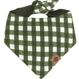 Green and white checkered dog bandana with a brown leather patch on a white background