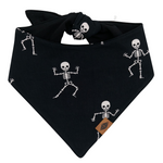 Black bandana with skeleton designs on a white background
