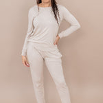 Woman in matching bamboo loungewear set in color Bisque